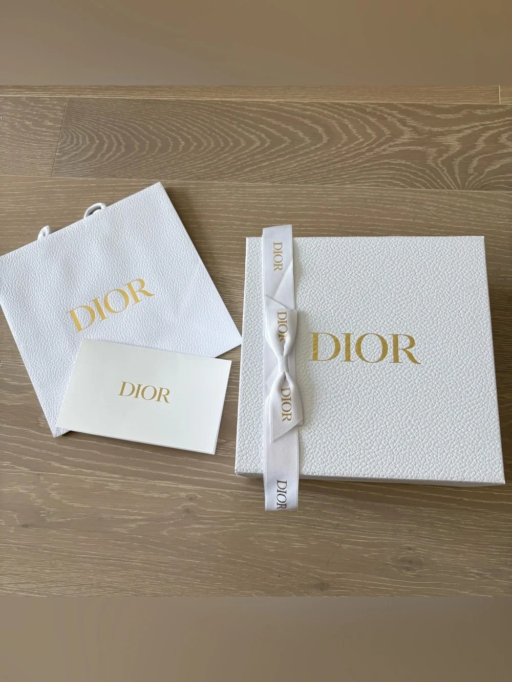 Dior gift box and bag with logo ribbon